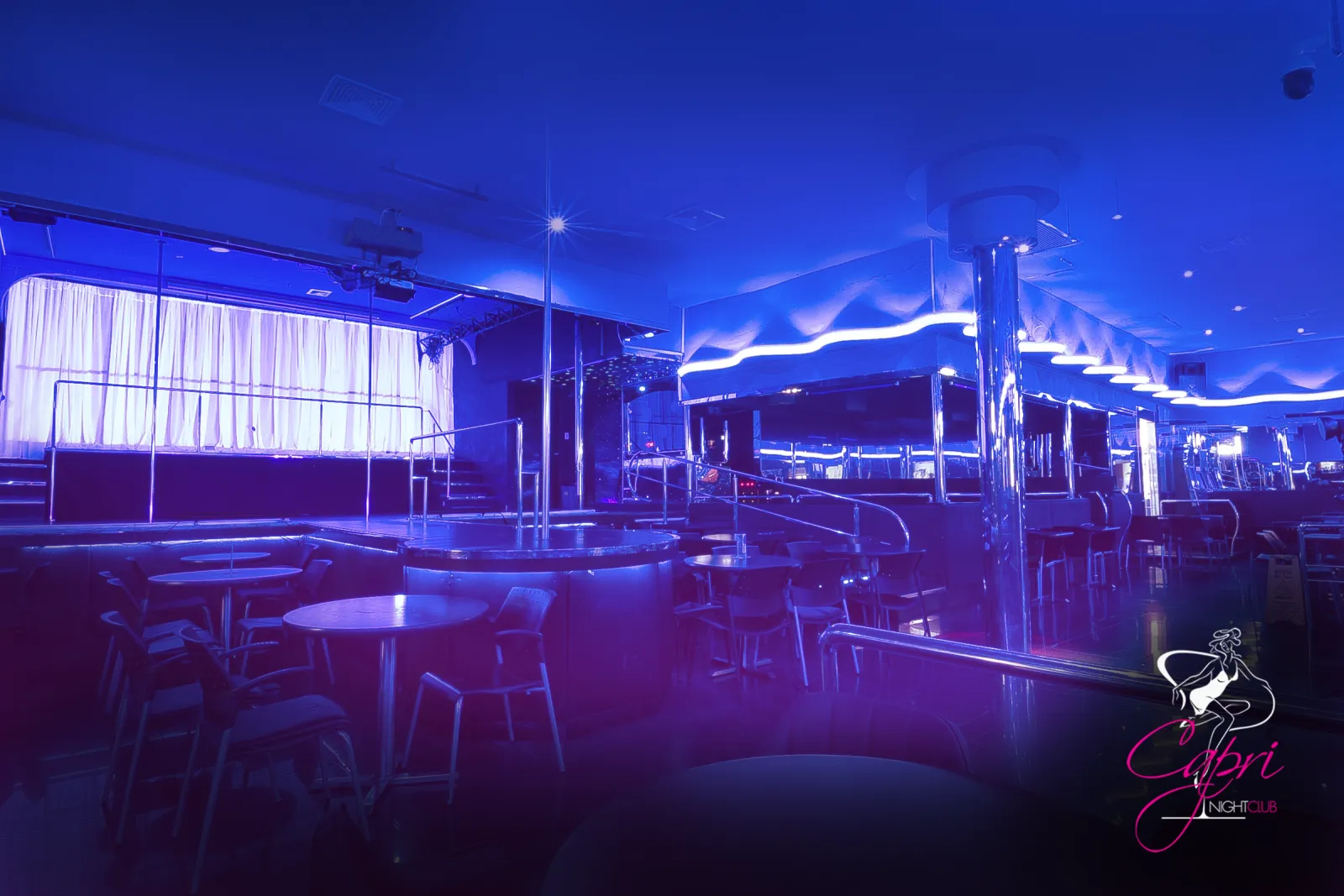 Zona de mesas de Capri Night Club
